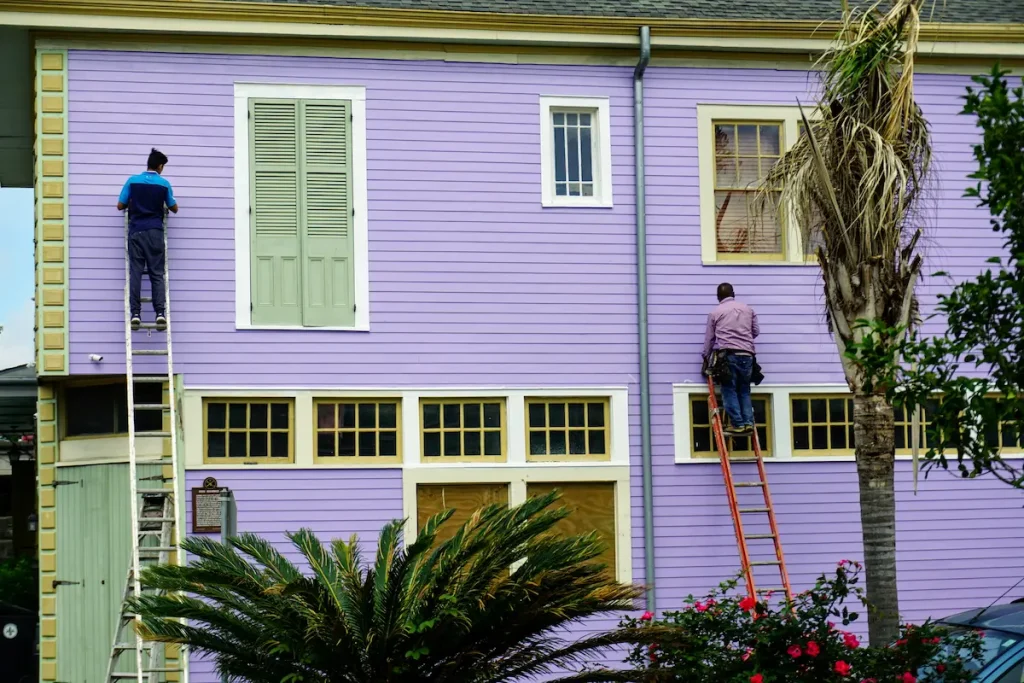 people working on gutters